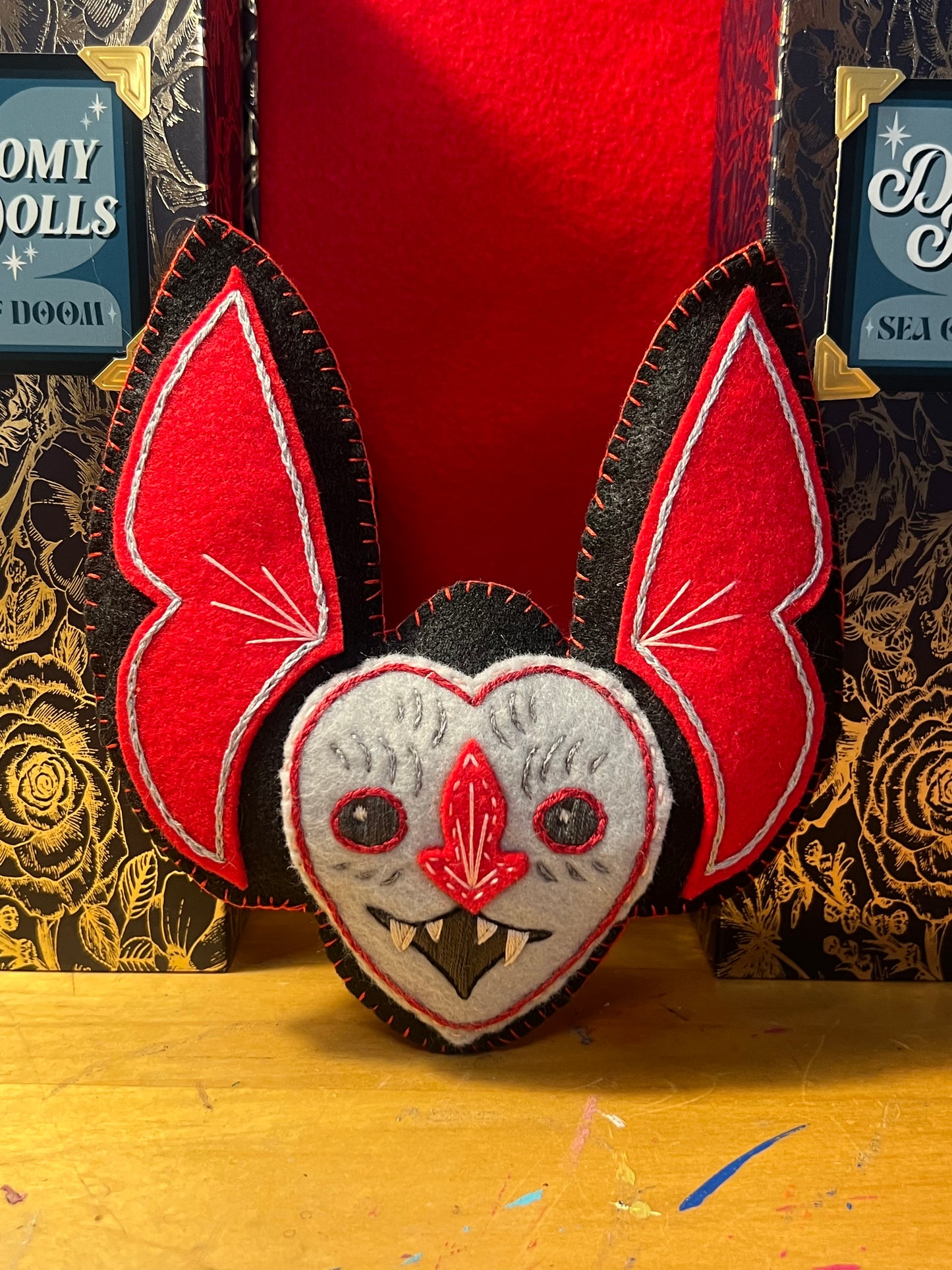 Doomy Doll: Black, Red, and Gray Bat Head